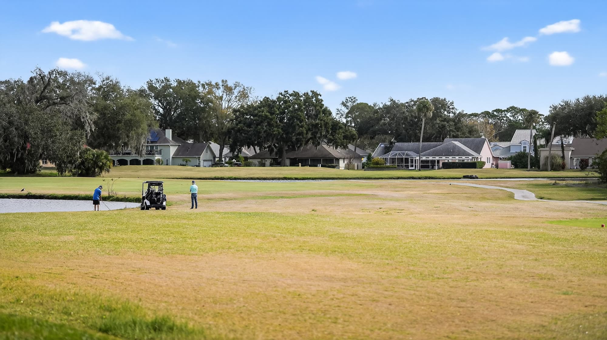 Aerial drone view of a waterfront property lot