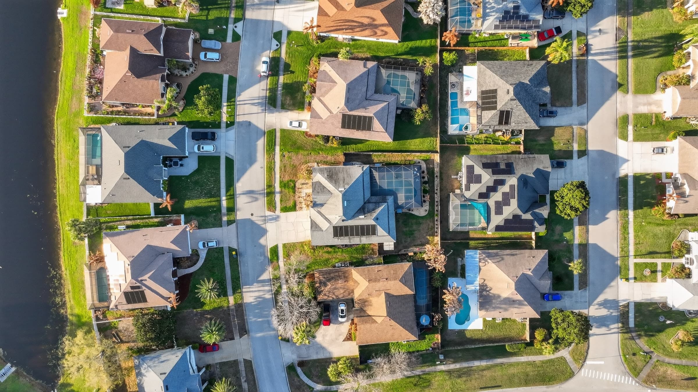 Top-down drone view of a waterfront property