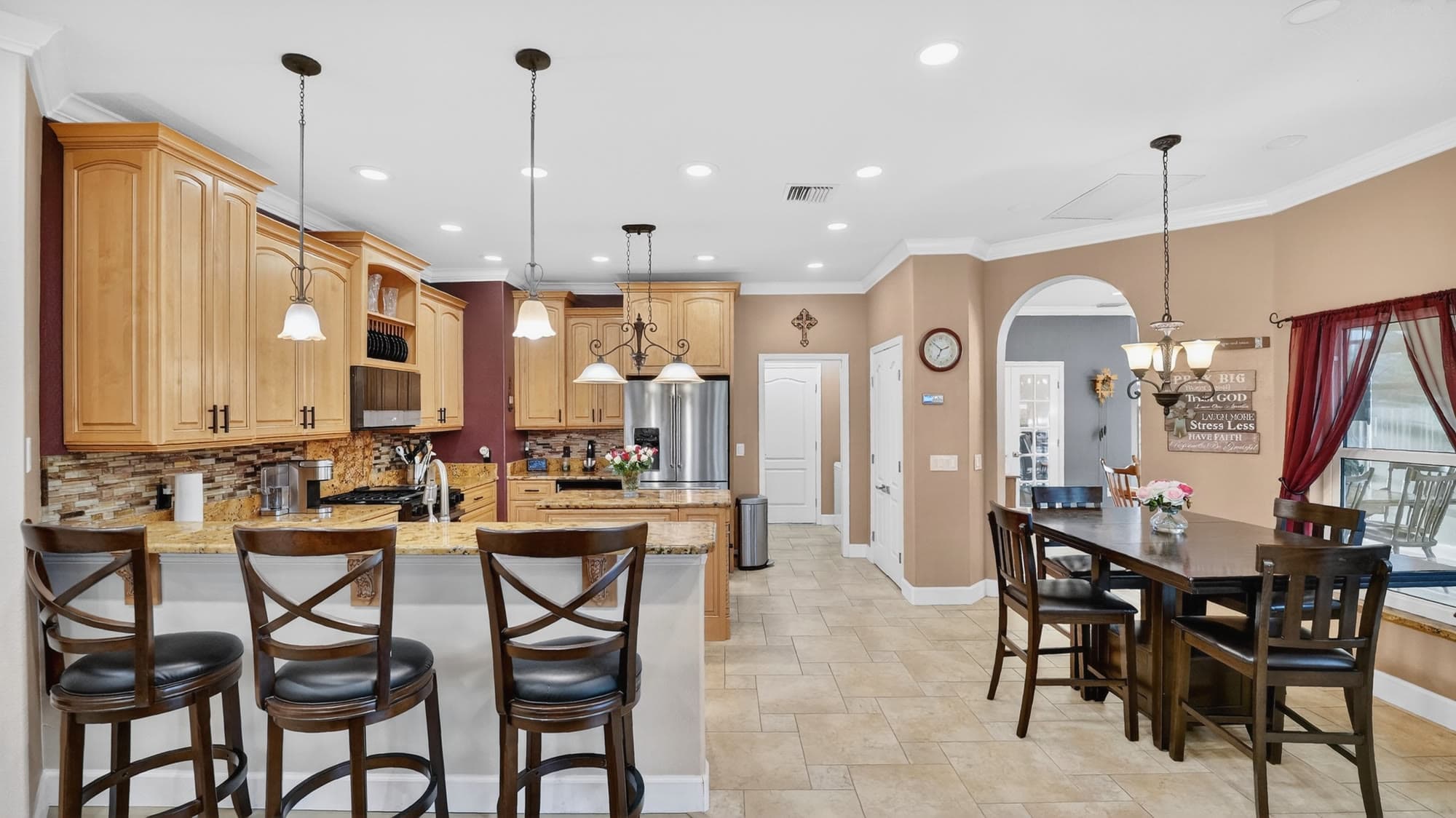 Warm-toned kitchen with custom wood cabinetry